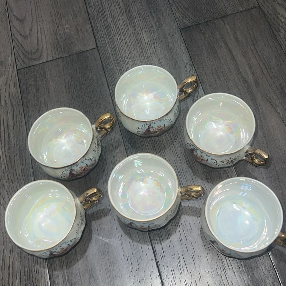 Set of 6 Victorian vintage like iridescent and gold trim teacups